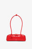 Le Teckel small red leather bag