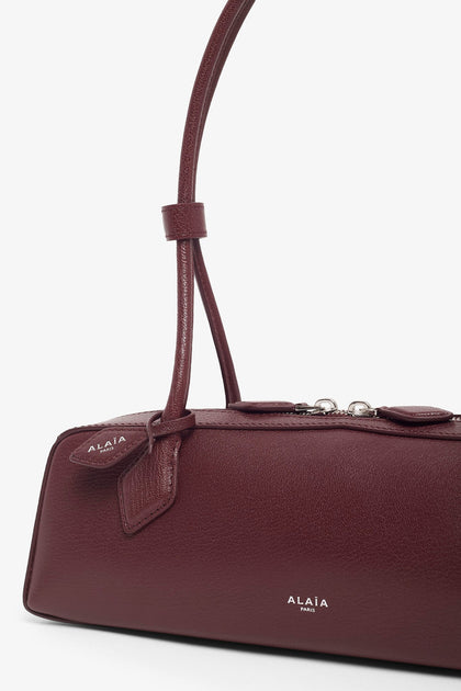 【色香漂うバーガンディ】ALAIA LE CLICK Medium Bag Dark Red ALAÏA: Burgundy 'Le Click' East West Medium Bag | SSENSE