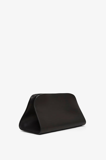 The Row | Peggy black leather clutch | Savannahs
