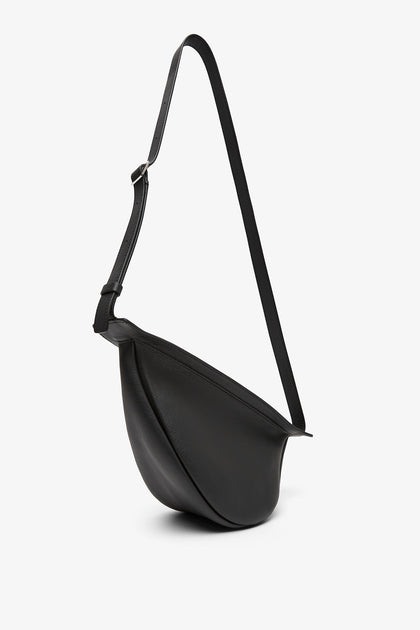The Row | Slouchy banana small black shoulder bag | Savannahs