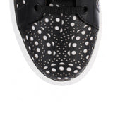 Black laser-cut sneaker