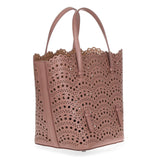 Tan leather laser-cut bag