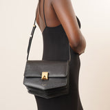Le Papa black grained leather bag