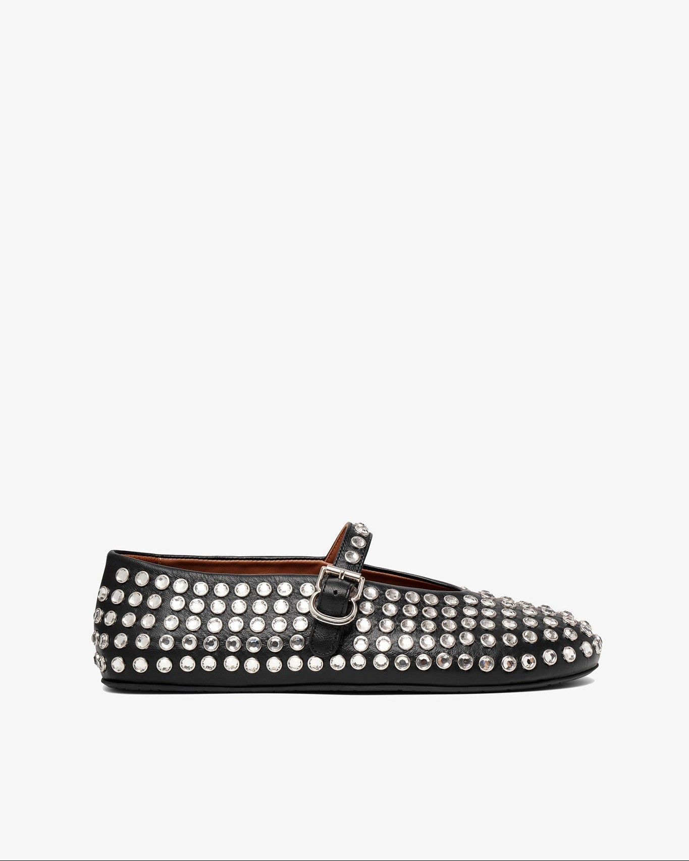 Black studded flat shoe on a white background