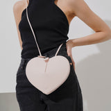 Le Coeur pink leather crossbody bag