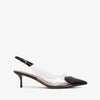 Black sandal with clear heel on a white background