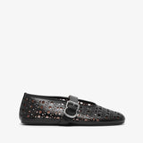 Black perforated shoe with a buckle on a white background