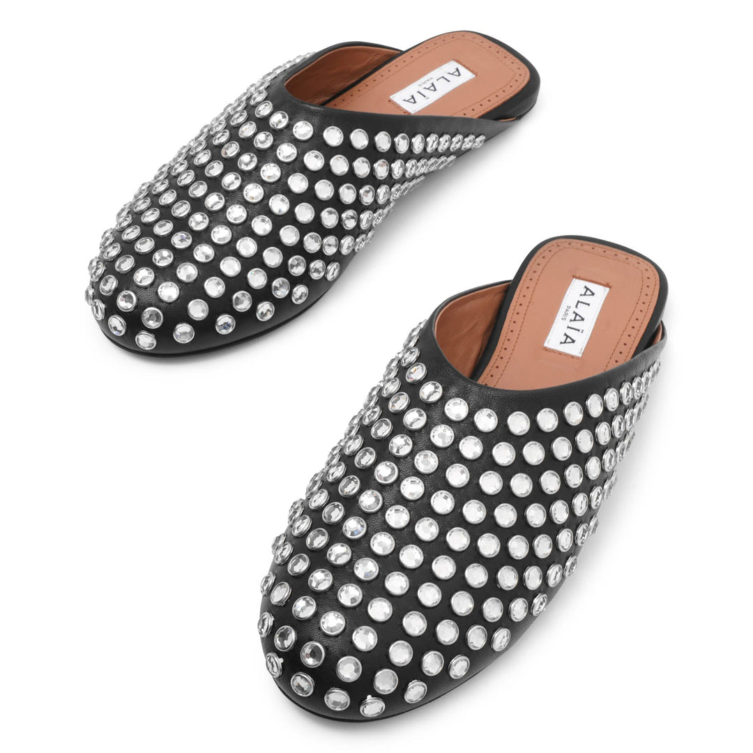 Alaïa | Embellished black leather mule flats | Savannahs