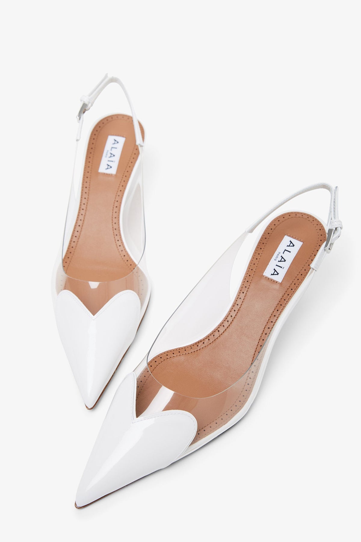 Shop Alaïa Le Coeur Patent White Slingbacks