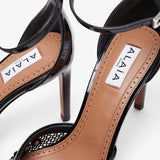 Black mesh pumps