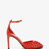 Red studded fishnet pumps
