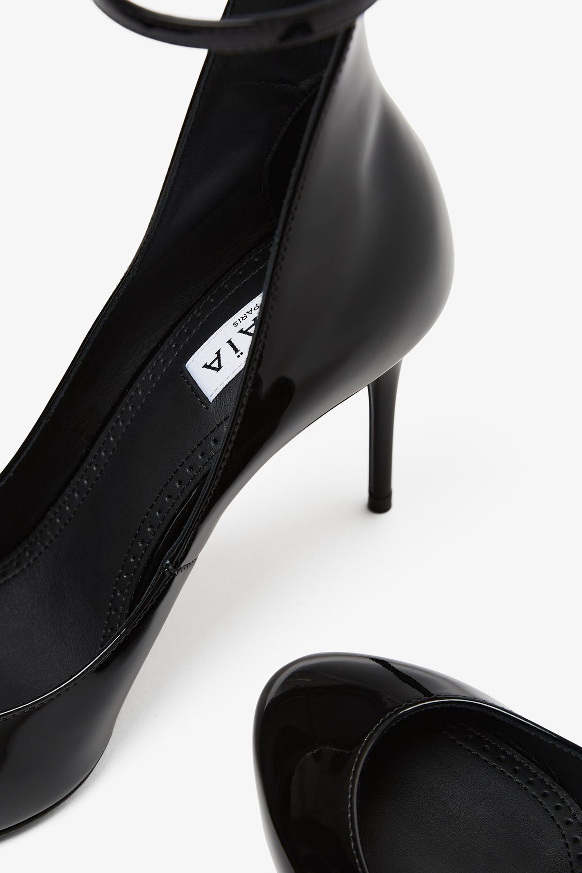 Shop Alaïa Pumps 90 Black Patent Pumps