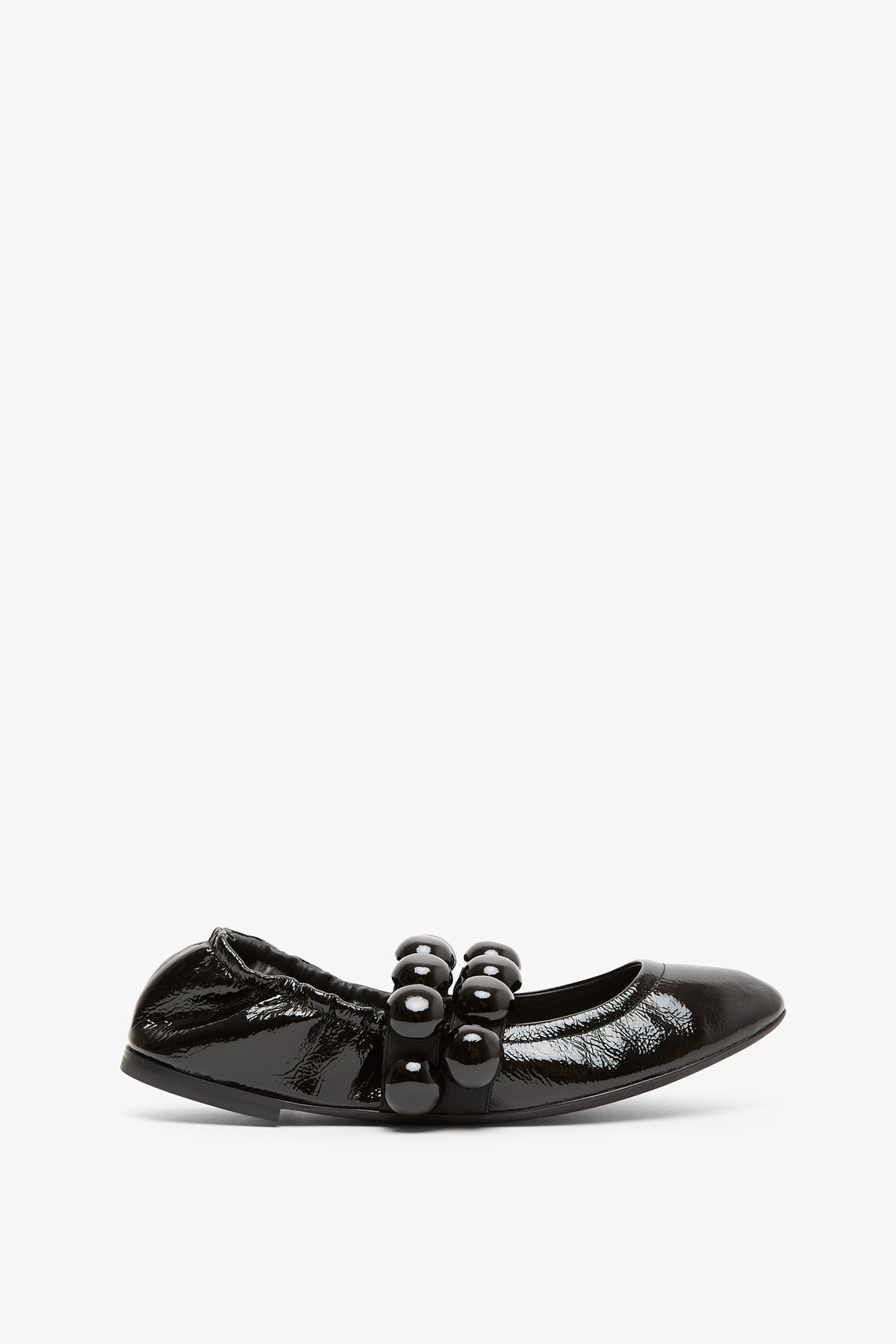 Shop Alaïa Sphere Patent Leather Ballerinas