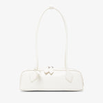White handbag with a bow detail on a white background