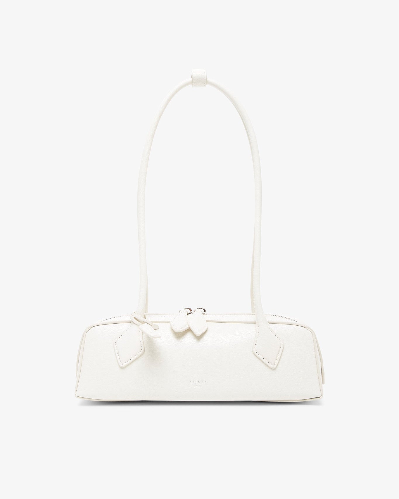 White handbag with a bow detail on a white background