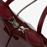 Le Coeur dark red patent crossbody bag