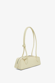 Le Teckel Small light yellow bag