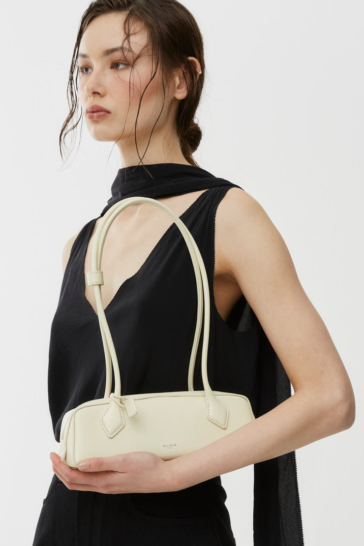 Le Teckel Small light yellow bag