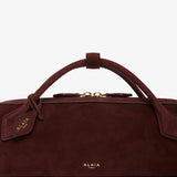 Teckel Clutch dark red bag