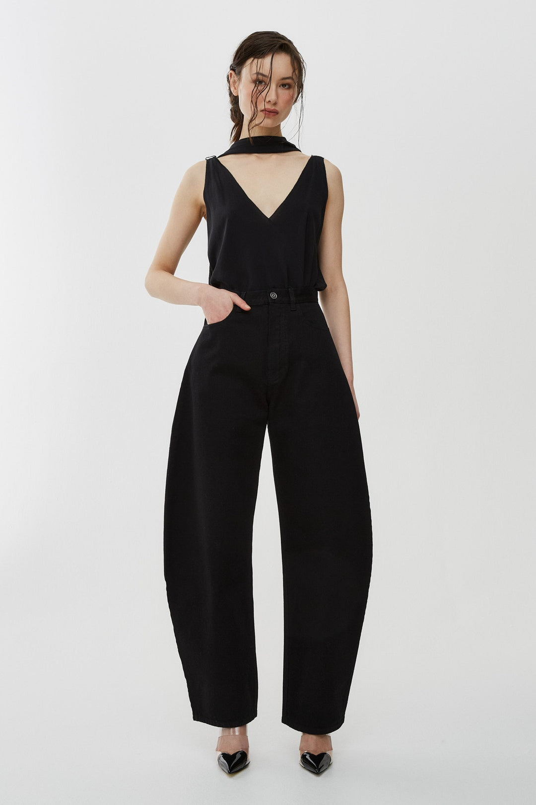 Alaïa | Round black denim pants | Savannahs
