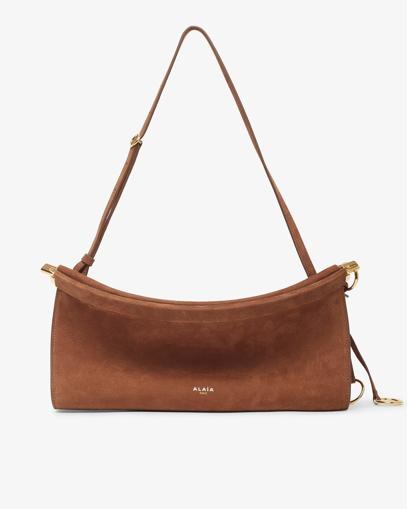 Brown leather handbag with a strap on a white background