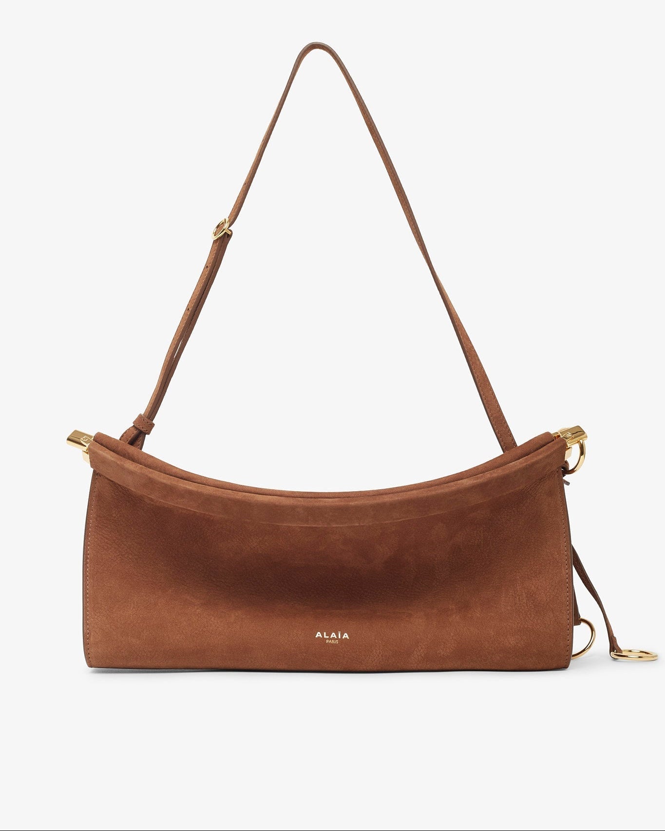 Brown leather handbag with a strap on a white background