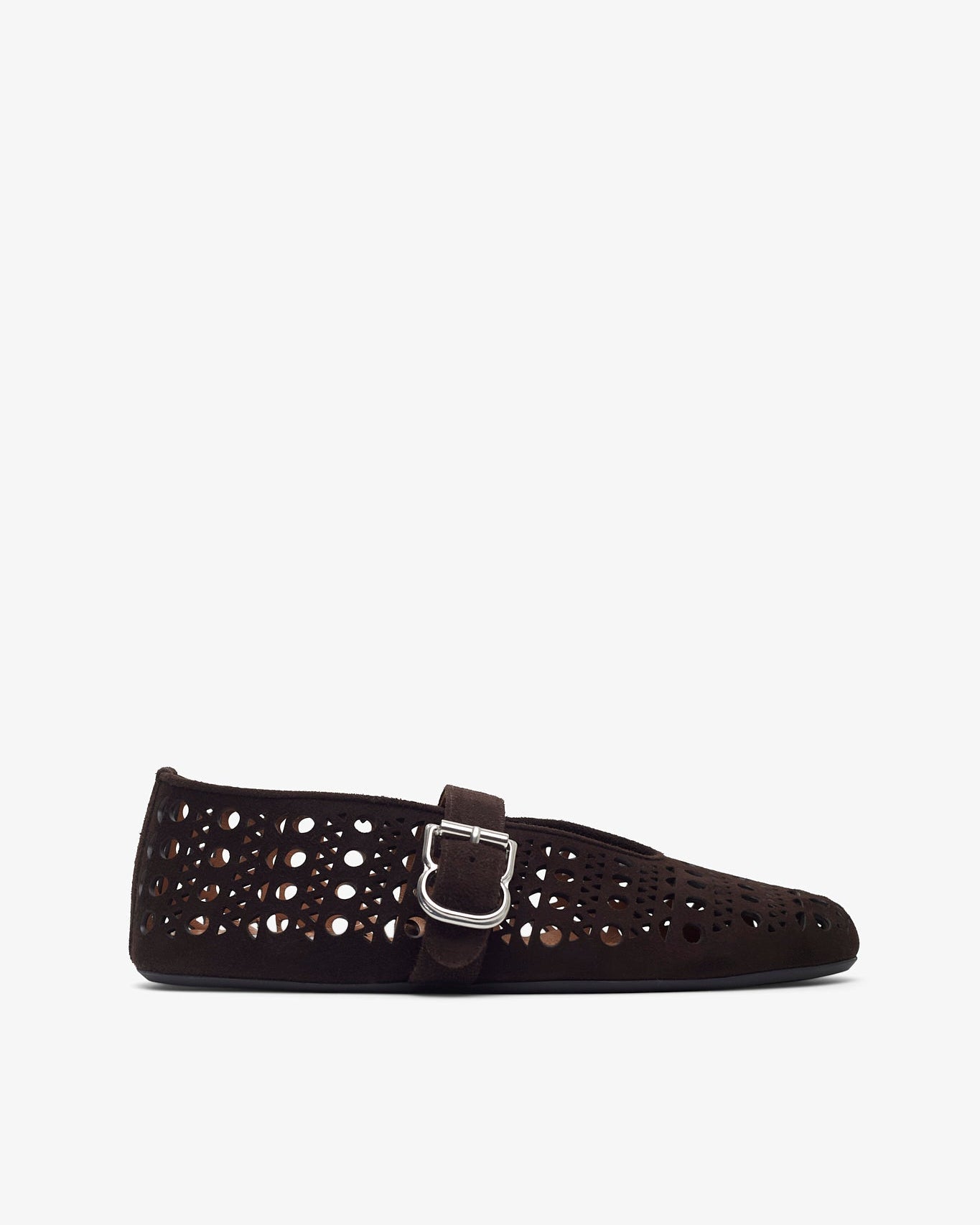 Pair of tan sneakers on a white background