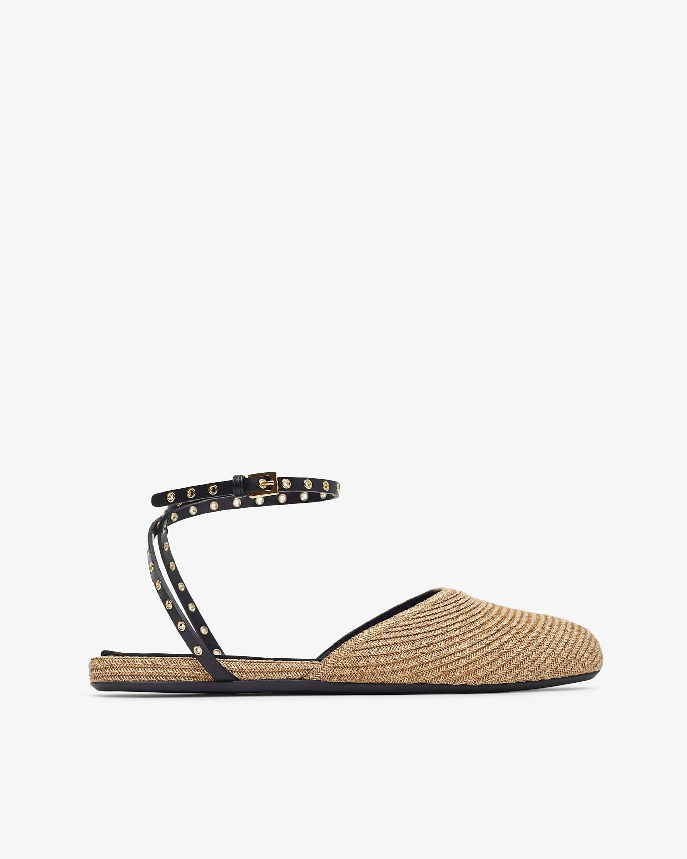 Beige flat sandal with studded detail on a white background