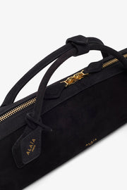 Le Teckel black clutch