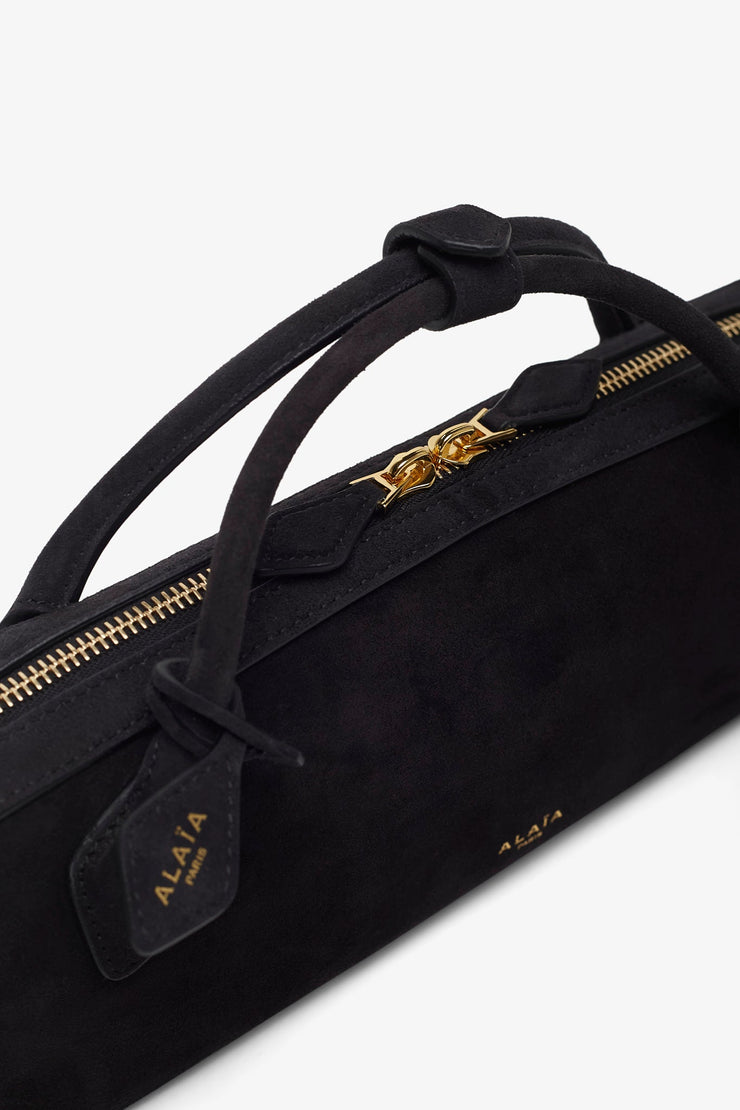 Le Teckel black clutch