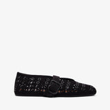 Black sneakers with white soles on a white background