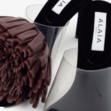 Asymmetric suede pom pom sandals