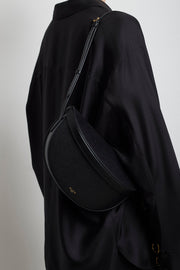 Hip east west black leather bag