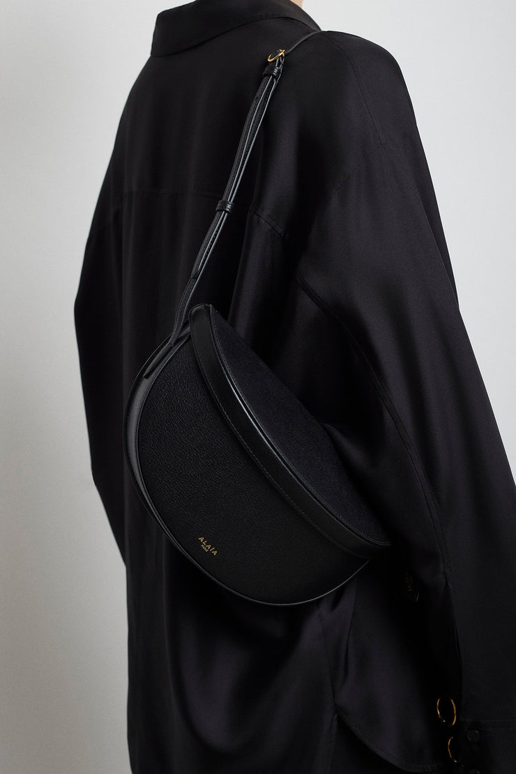 Hip east west black leather bag