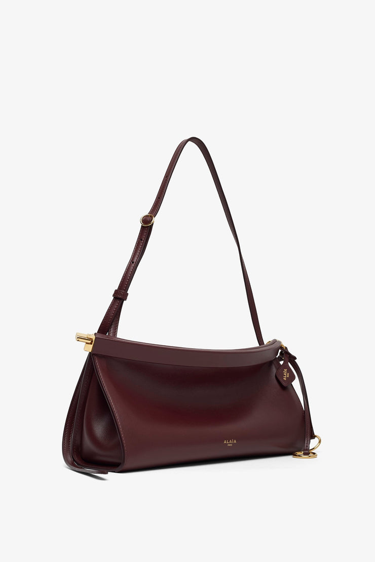 Le Click east west medium dark red bag