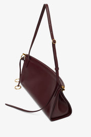 Le Click east west medium dark red bag