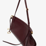 Le Click east west medium dark red bag