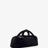 Le Teckel black shearling clutch