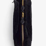 Le Teckel black shearling clutch