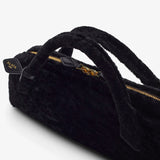 Le Teckel black shearling clutch