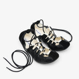 Laced black leather ballet flats