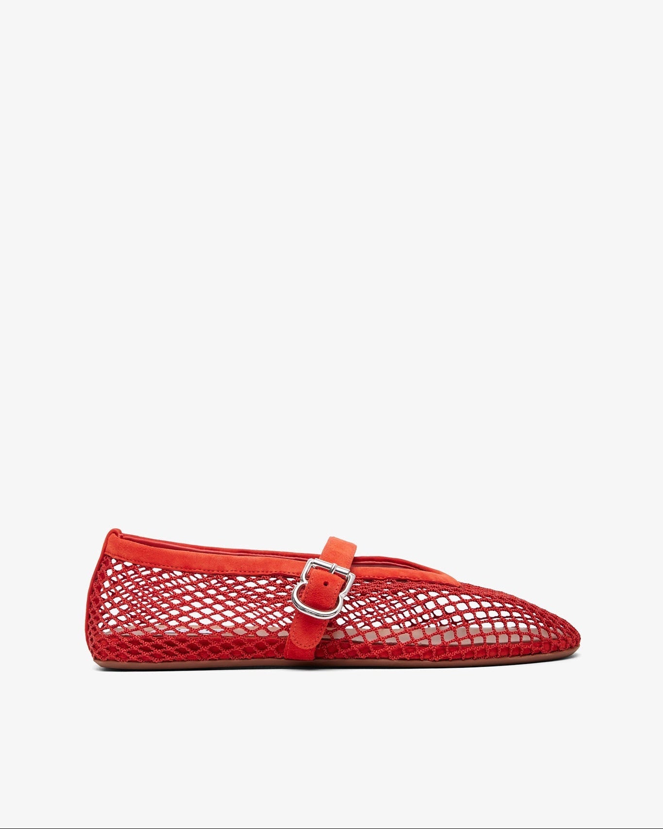 Red perforated ballerina shoe on a white background