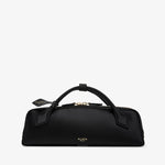 Black handbag with gold accents on a white background