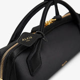 Le Teckel black clutch