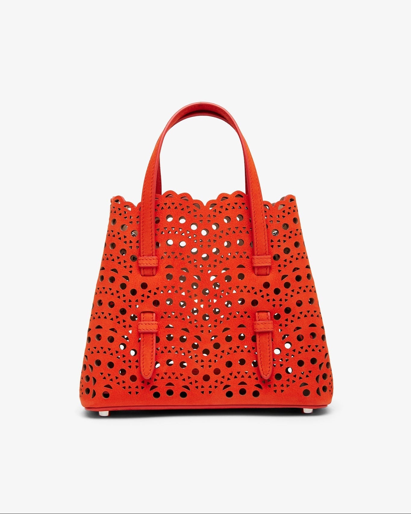 Red perforated handbag on a white background