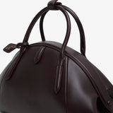 Top handle small burgundy bag