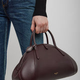 Top handle small burgundy bag