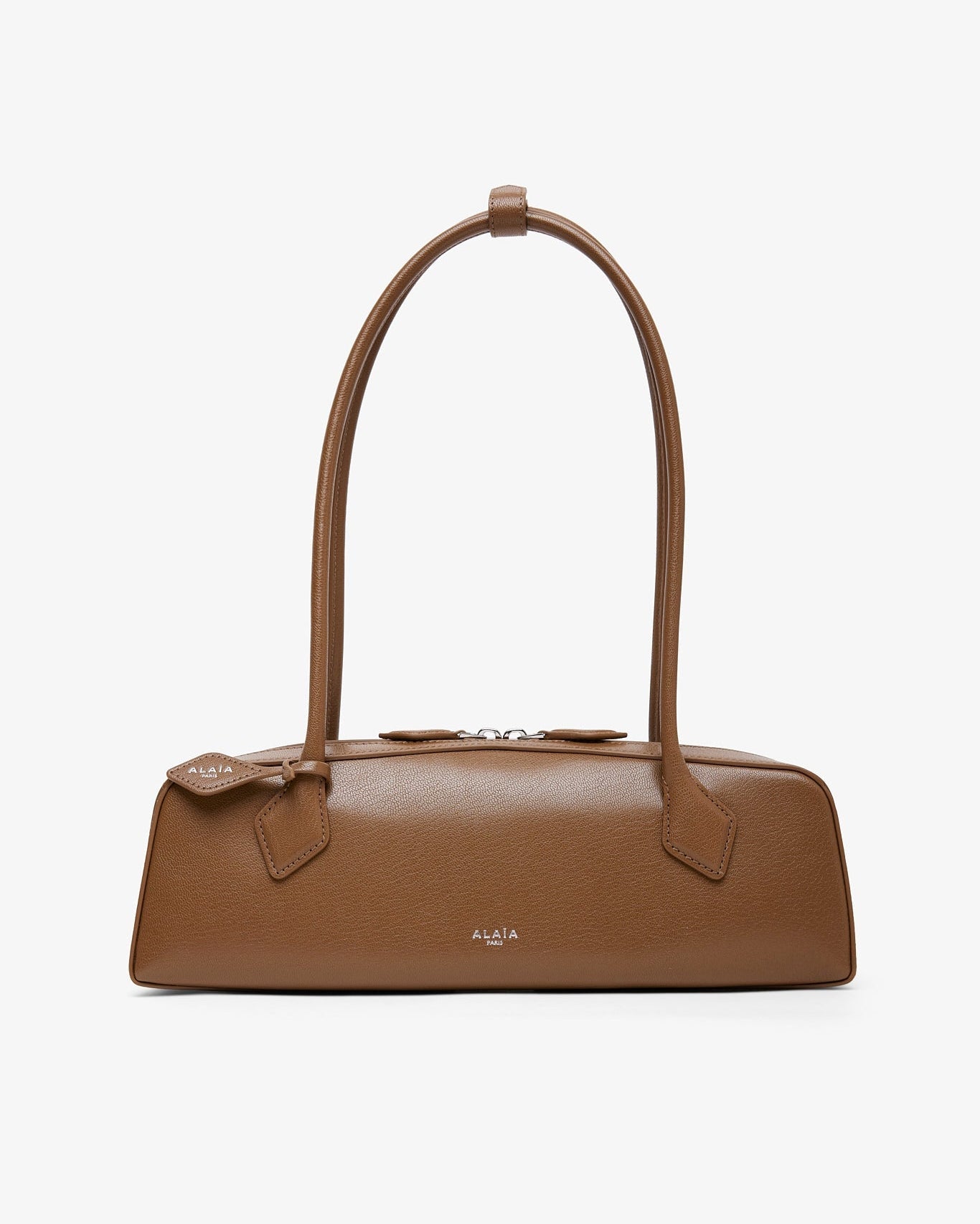 Brown handbag on a light beige background