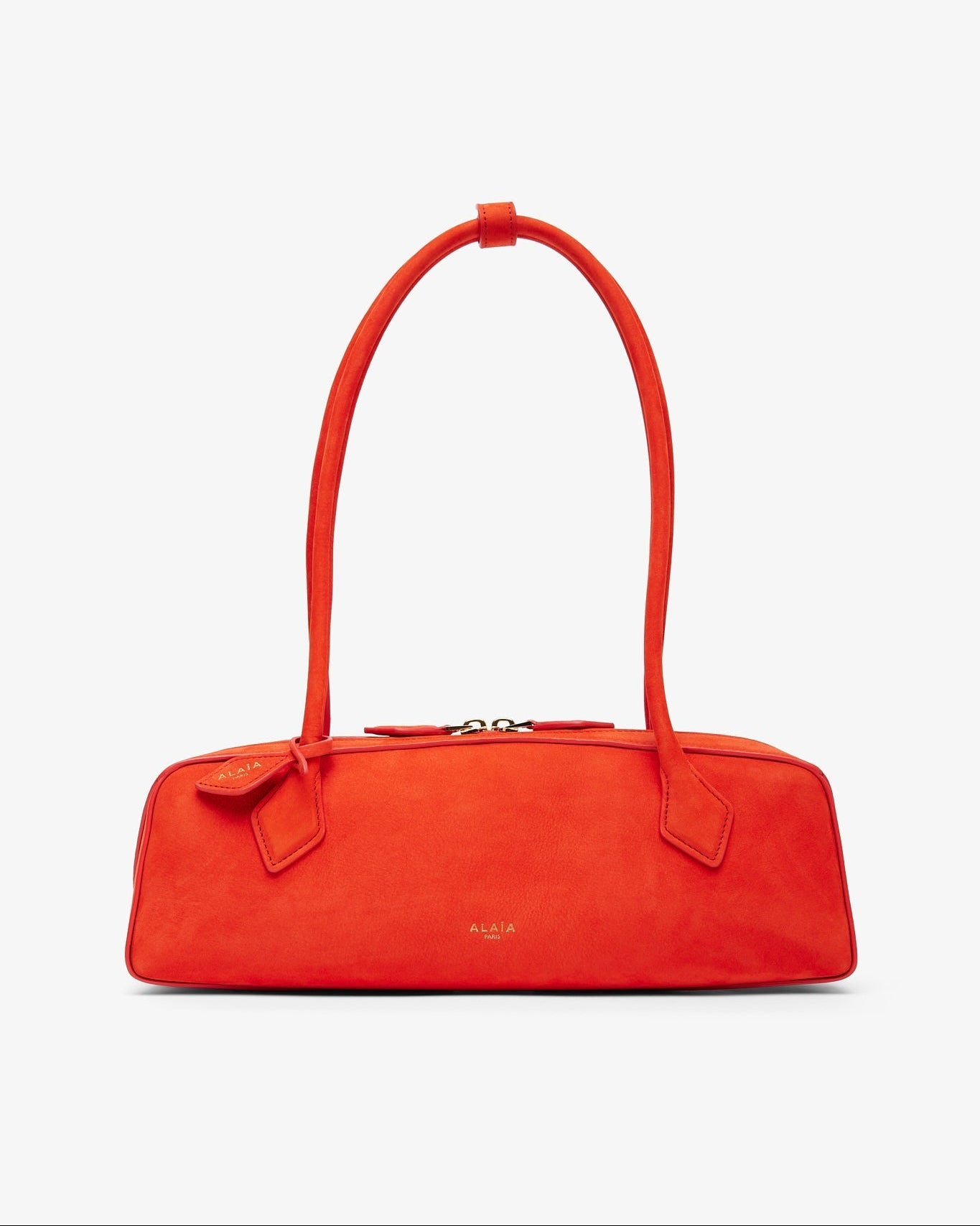 Red handbag with a bow detail on a white background