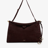 Brown handbag with a strap on a white background